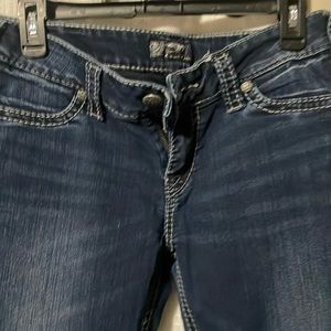 Silver suki super stretch size 30 and 31 long skinny.